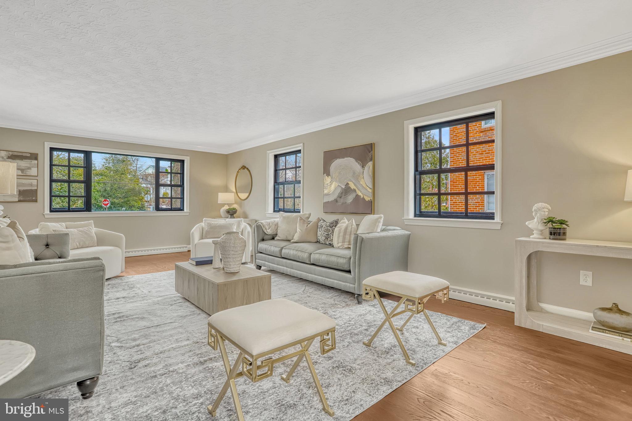826 West Braddock Road Alexandria, VA 22302 - Photo 9 of 56 a living room with furniture and a window