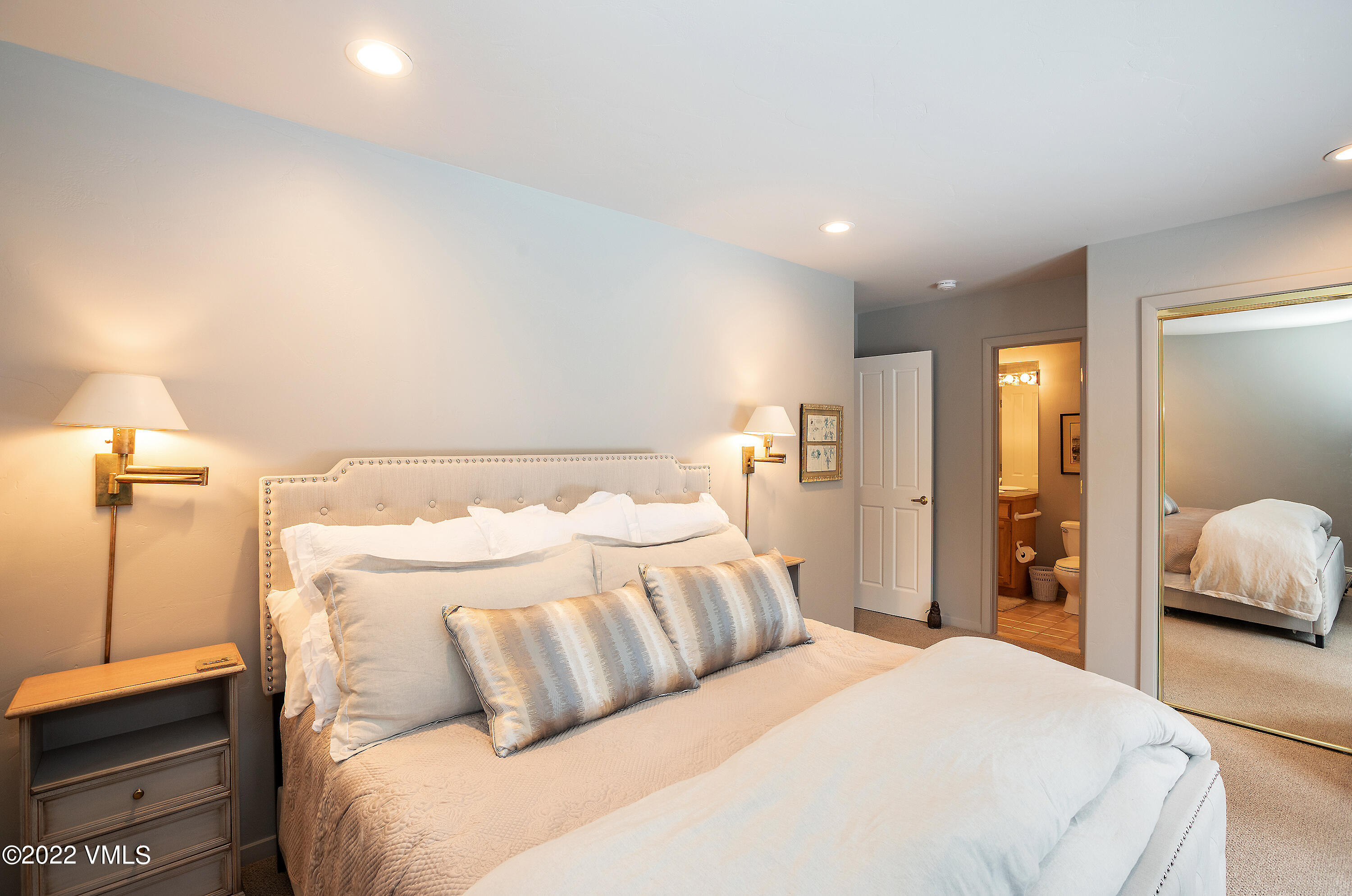 1850 South Frontage Road West, Unit 3 Vail, CO 81657 - Photo 14 of 28 a bedroom with a bed and a walk in closet
