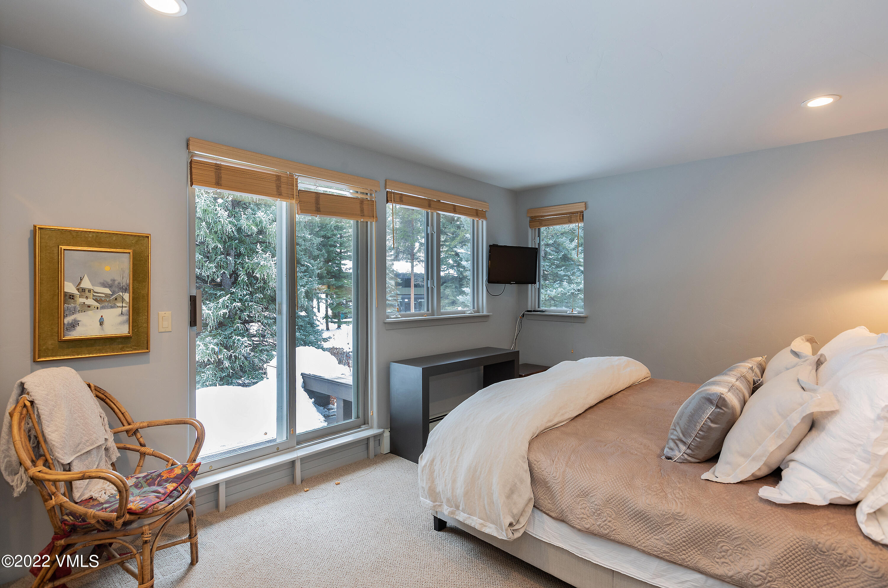 1850 South Frontage Road West, Unit 3 Vail, CO 81657 - Photo 15 of 28 a bedroom with a bed chair and window
