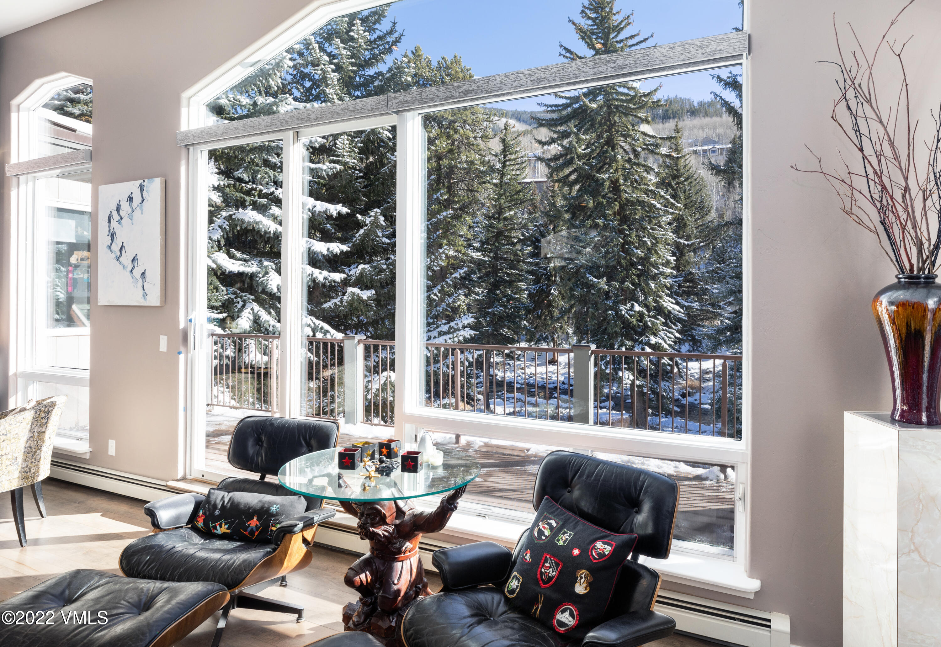 1850 South Frontage Road West, Unit 3 Vail, CO 81657 - Photo 2 of 28 a living room with furniture and a large window