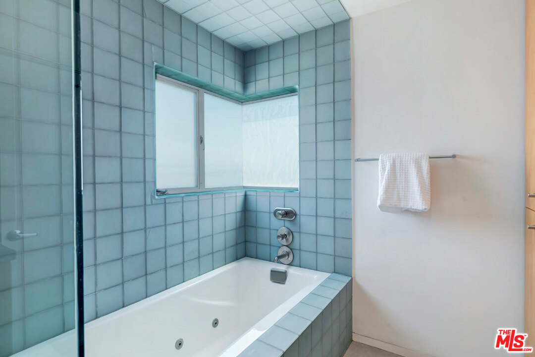32 Fleet Street Marina del Rey, CA 90292 - Photo 20 of 39 a bathroom with a bathtub and shower