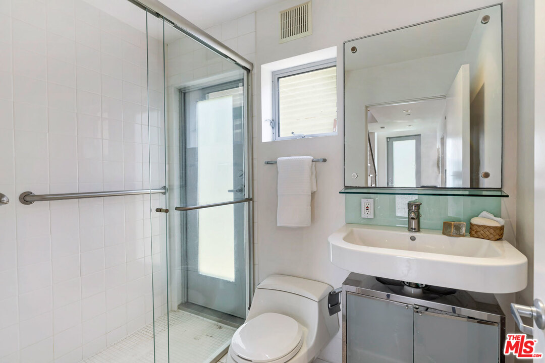 32 Fleet Street Marina del Rey, CA 90292 - Photo 27 of 39 a bathroom with a sink toilet and shower