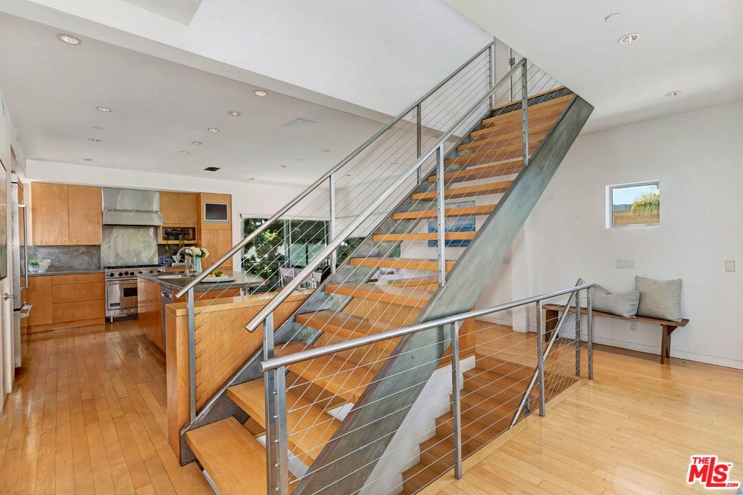 32 Fleet Street Marina del Rey, CA 90292 - Photo 7 of 39 a view of a livingroom with furniture and stairs