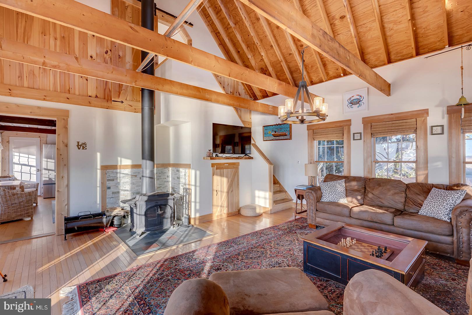 7950 Riverview Road Westover, MD 21871 - Photo 4 of 57 a living room with furniture a fireplace and wooden floor