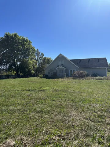 a view of an outdoor space and a yard