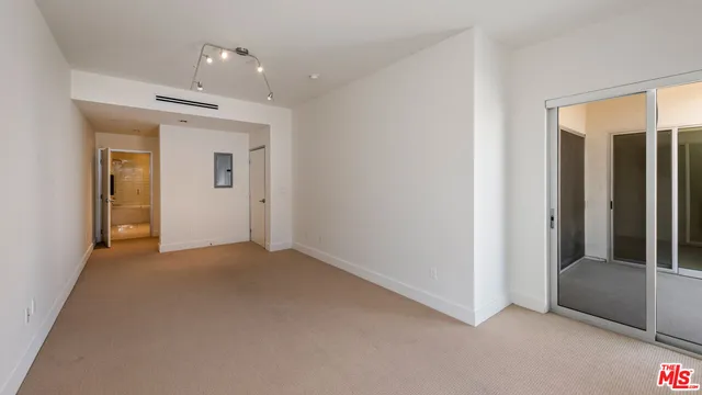 a view of a hallway with a white walls