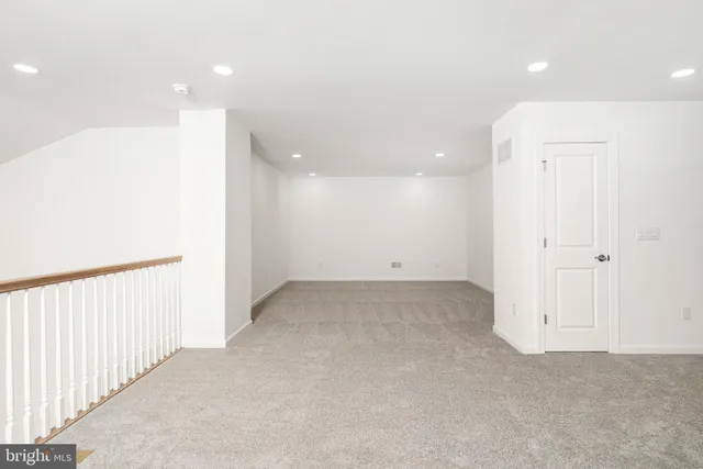 an empty room with an entryway