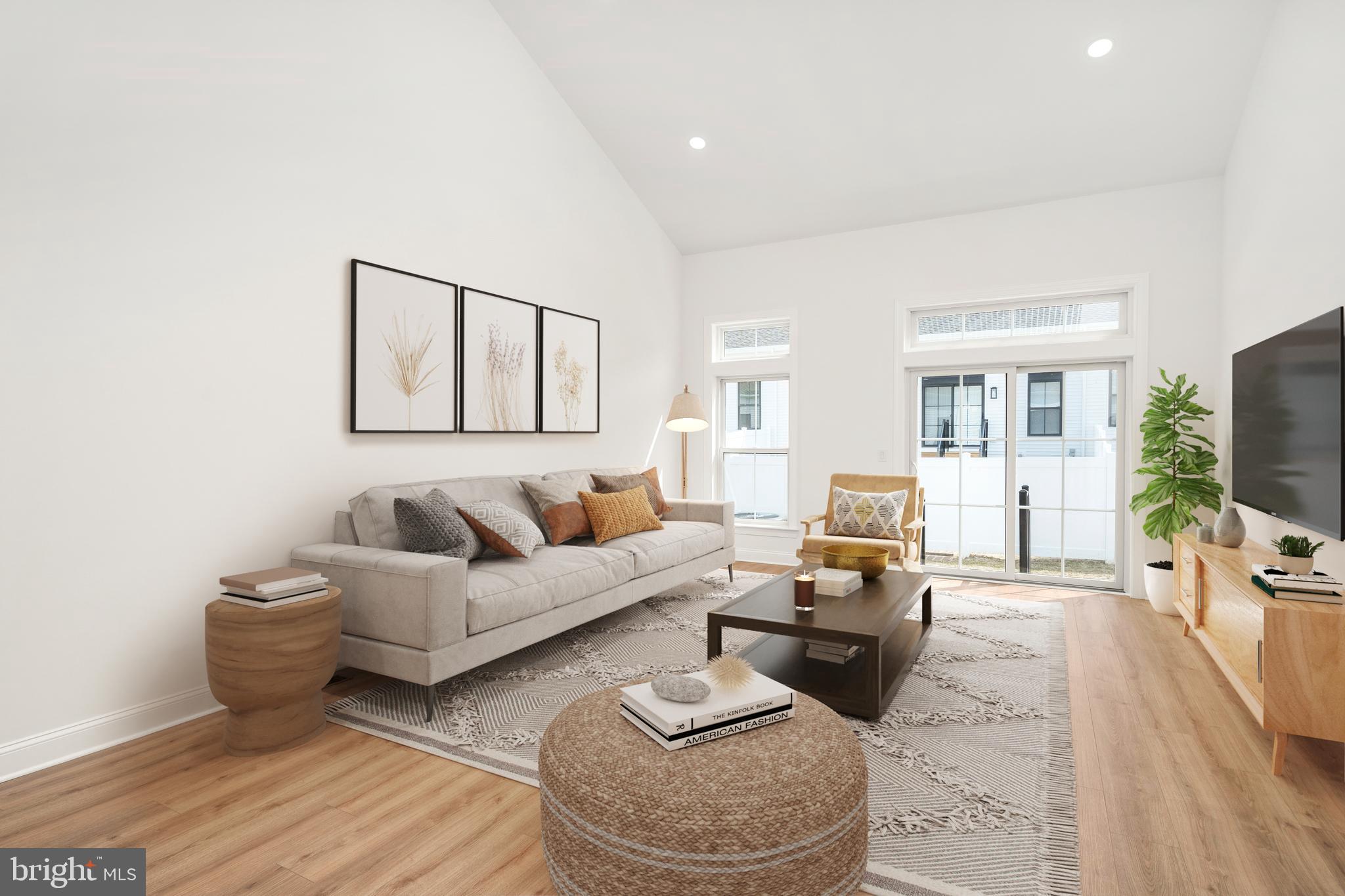 55 Kay Chiarello Way Hamilton, NJ 08690 - Photo 4 of 49 a living room with furniture and a flat screen tv