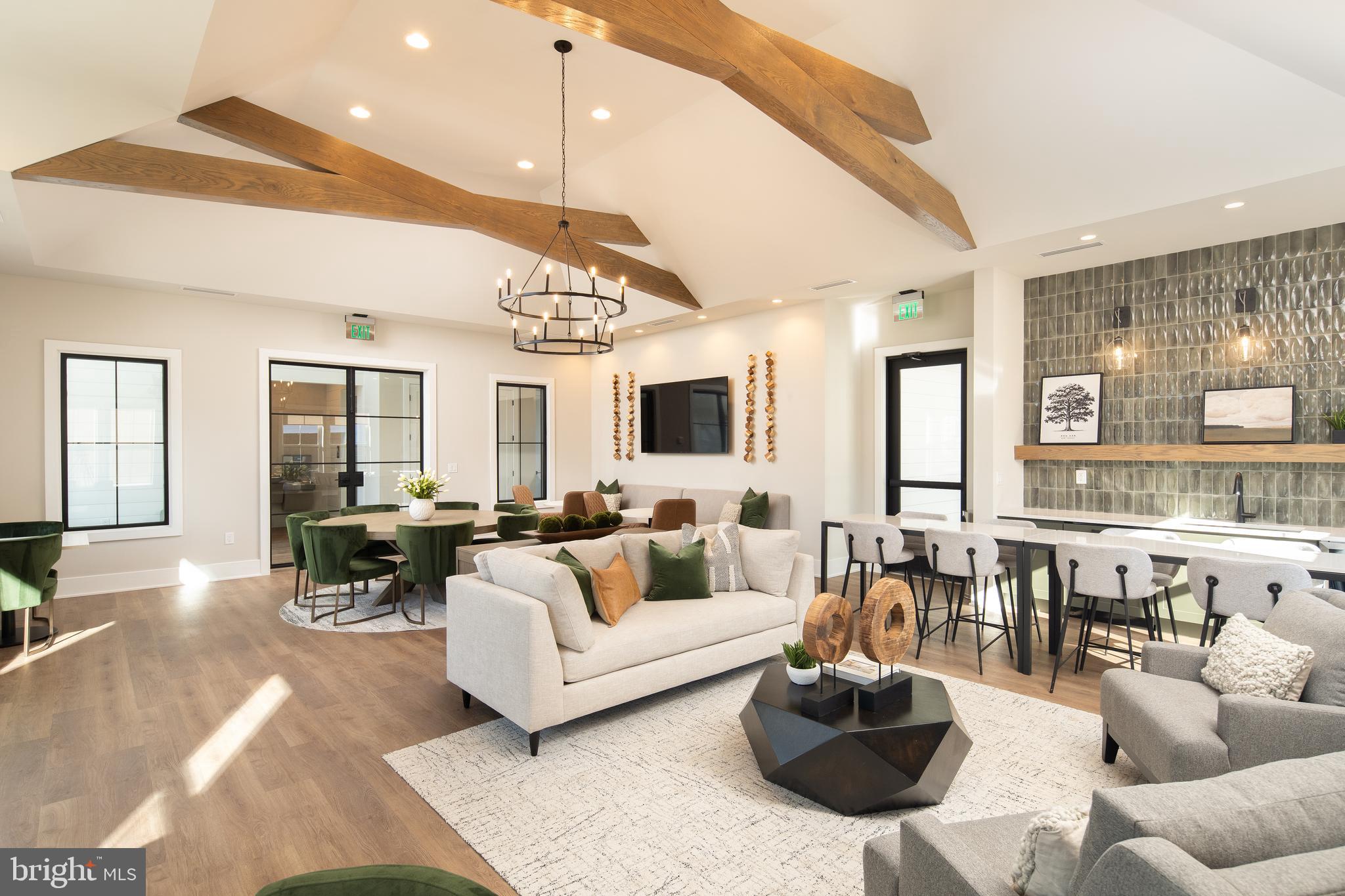 55 Kay Chiarello Way Hamilton, NJ 08690 - Photo 41 of 49 a living room with furniture a chandelier and a large window