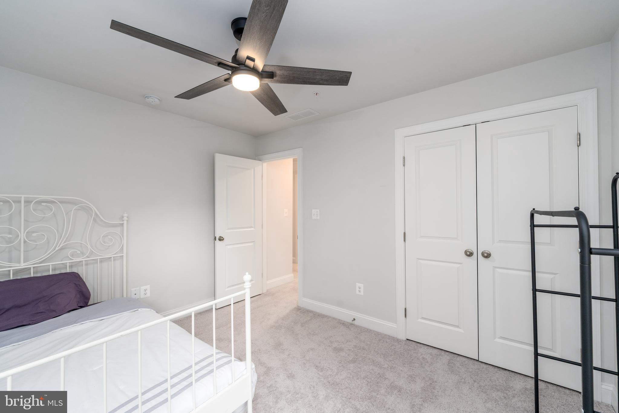 6210 Hunters Hollow Road Elkridge, MD 21075 - Photo 26 of 41 a view of a livingroom with a ceiling fan