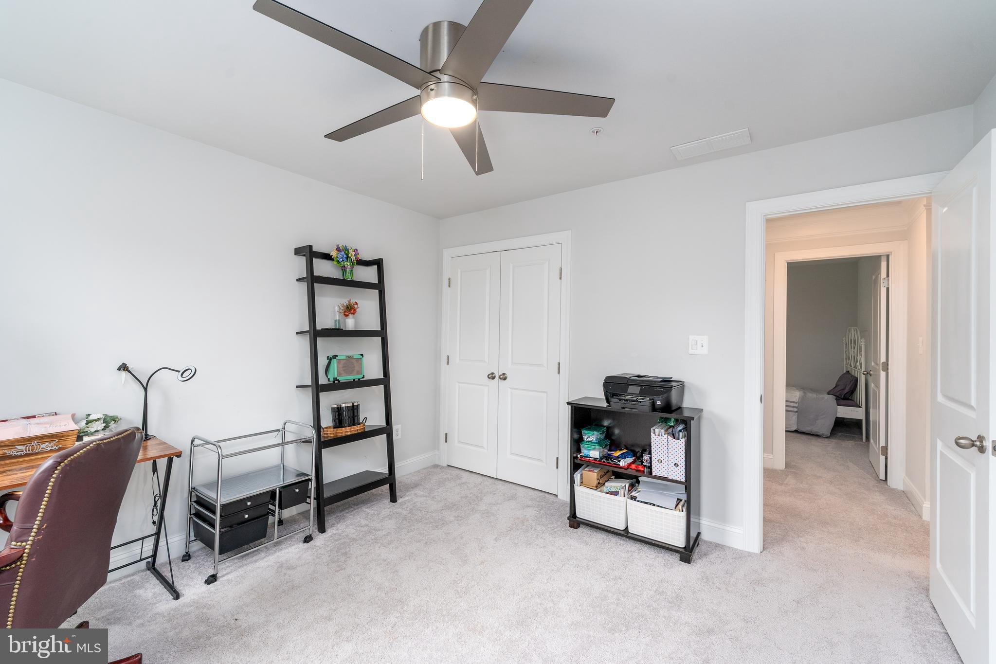6210 Hunters Hollow Road Elkridge, MD 21075 - Photo 29 of 41 a living room with furniture and a chandelier