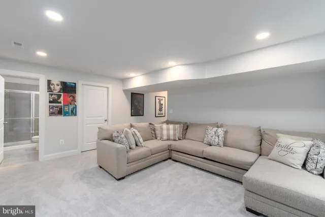 a living room with furniture and a couch