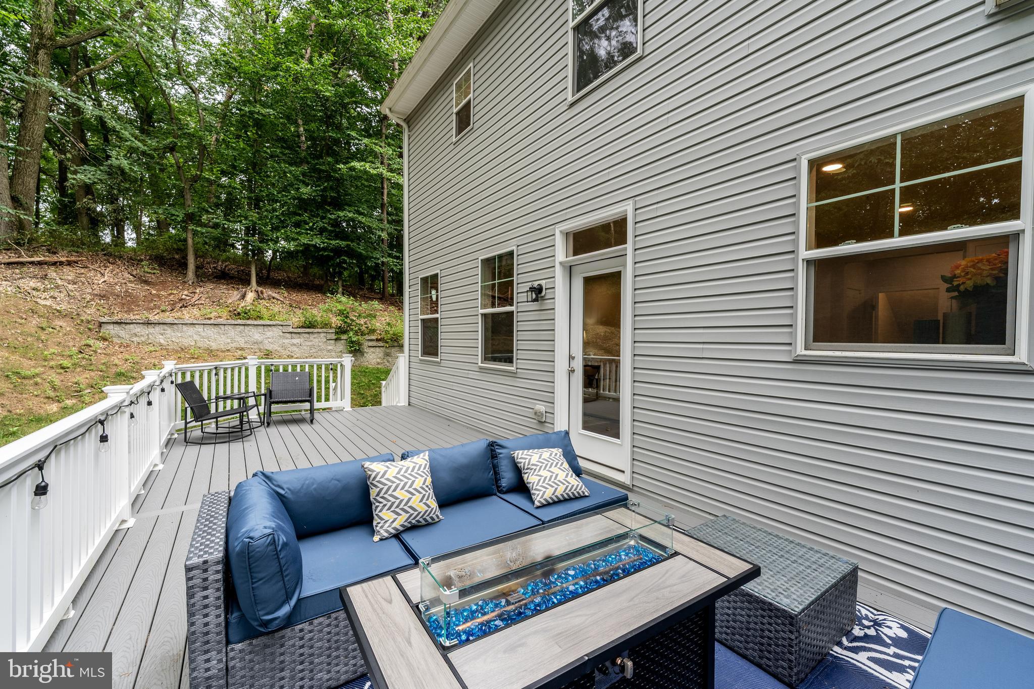 6210 Hunters Hollow Road Elkridge, MD 21075 - Photo 10 of 41 a balcony with furniture and a potted plant