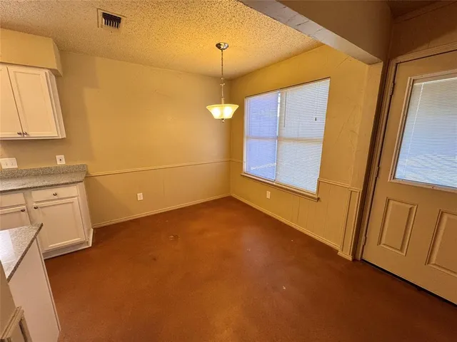 a view of a storage & utility room with a sink