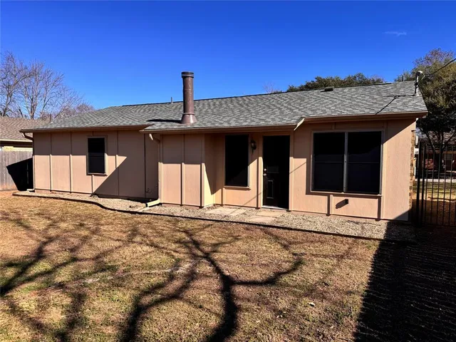 a view of a yard with an outdoor space