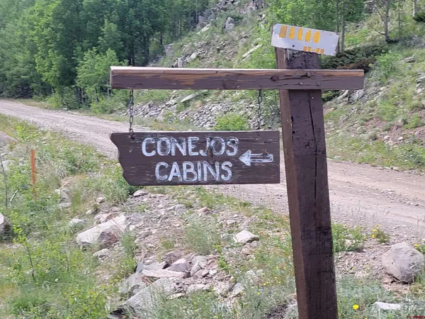 a sign on the side of the road