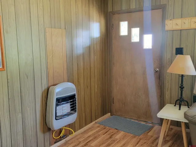 a bathroom with a sink a mirror and a shower
