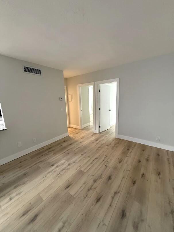 260 Northwest 19th Street, Unit 6 Boca Raton, FL 33432 - Photo 2 of 11 a view of an empty room and window