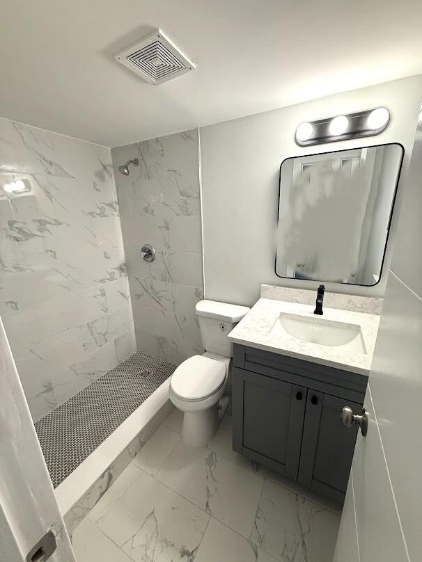 260 Northwest 19th Street, Unit 6 Boca Raton, FL 33432 - Photo 4 of 11 a bathroom with a sink toilet and shower