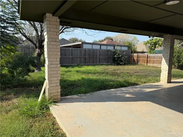a view of a porch with a yard