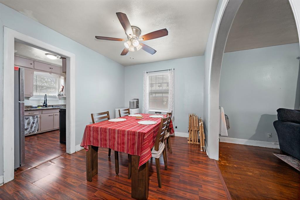 2119 Alexander Avenue Waco, TX 76708 - Photo 7 of 20 a view of a dining room with furniture and wooden floor