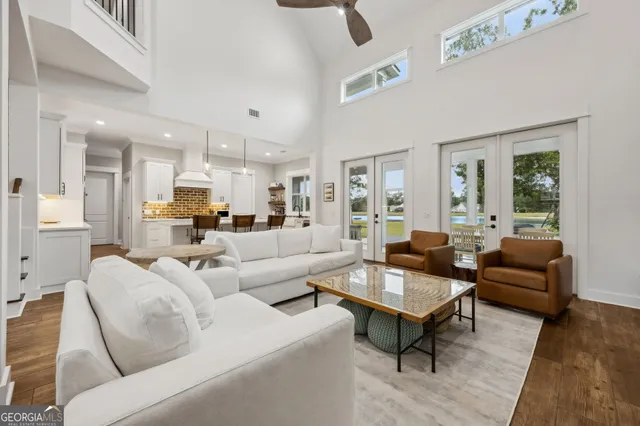 a bathroom with double vanity sink and a mirror
