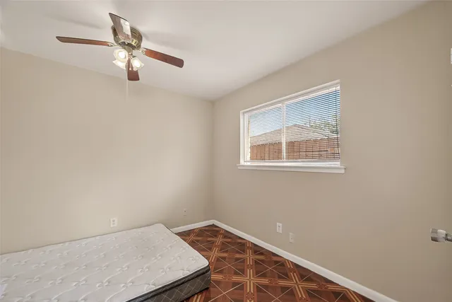a view of a hallway with a window