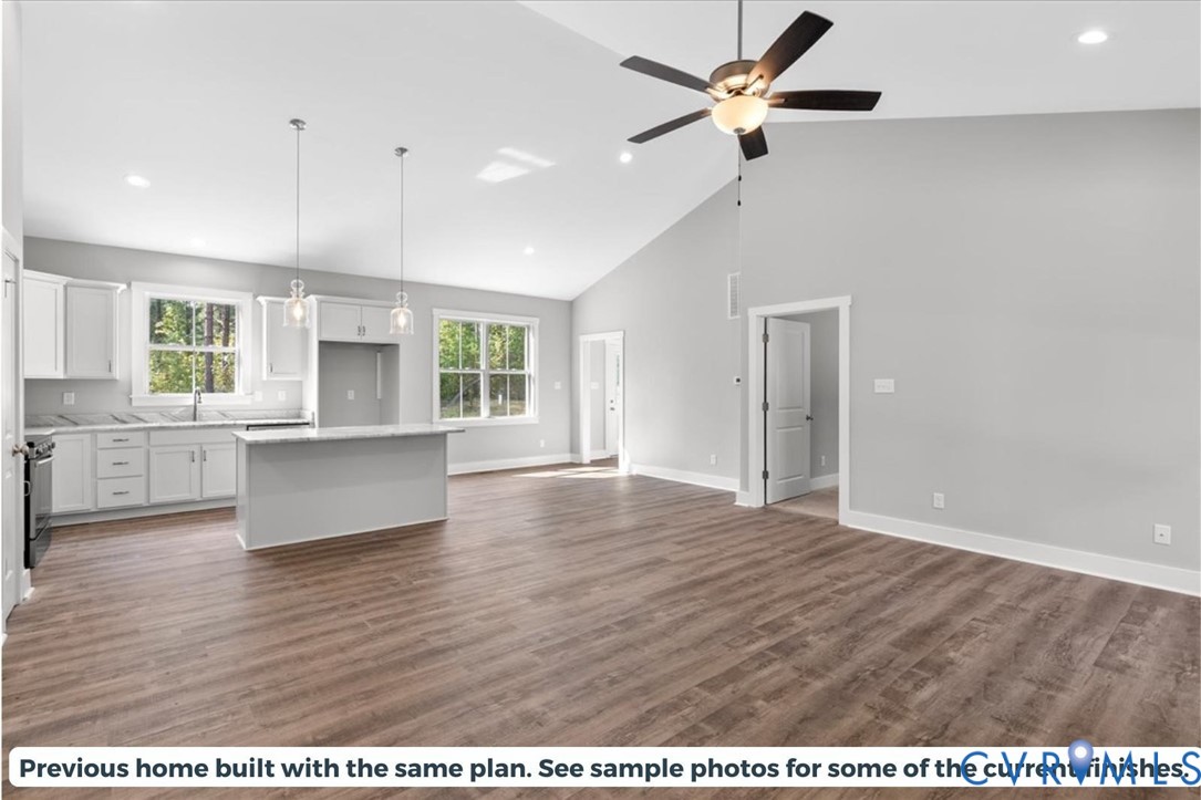 2638 West Creek Road Crewe, VA 23930 - Photo 10 of 29 a view of an empty room with window and wooden floor