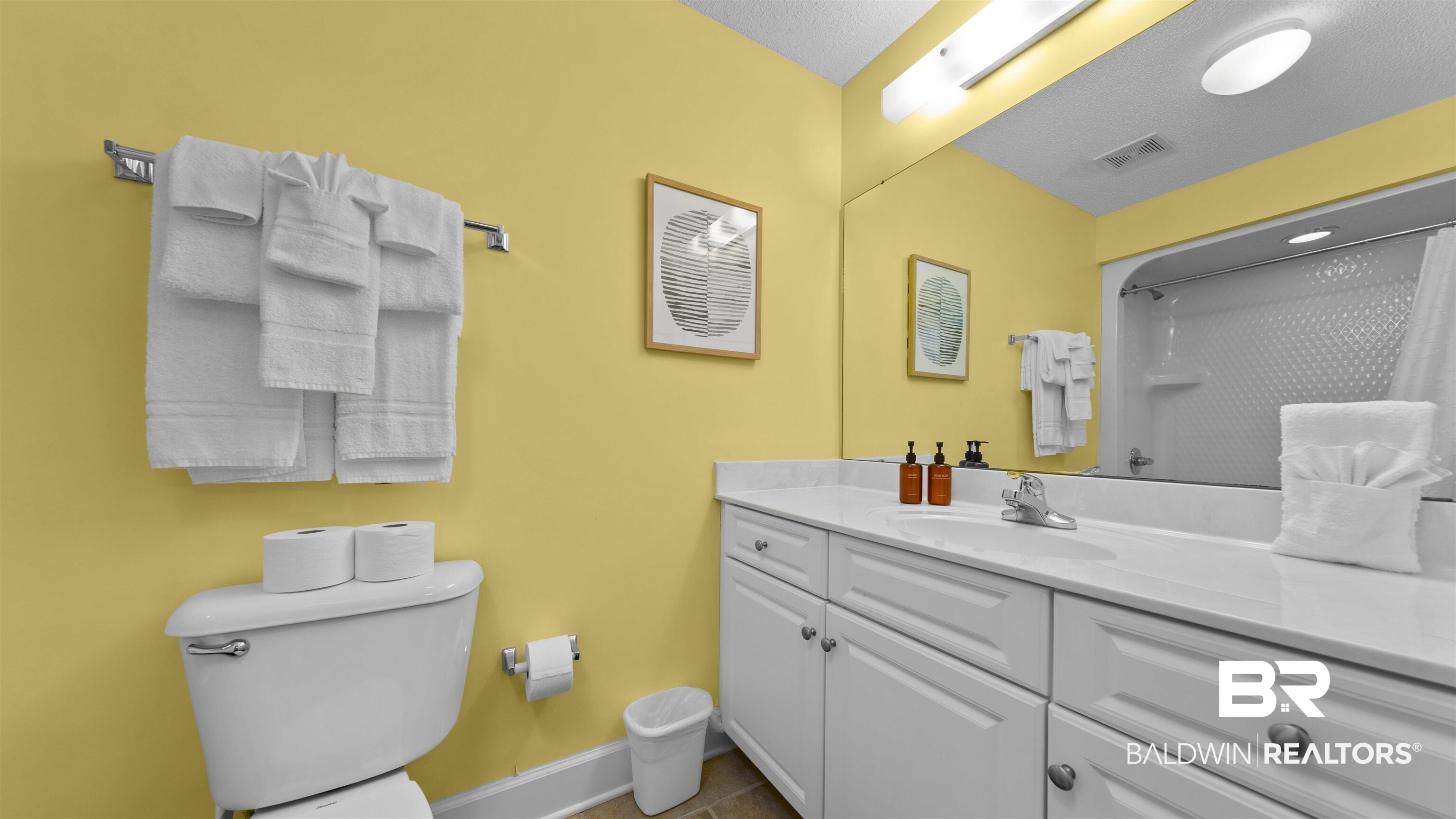 27582 Canal Road, Unit 2207 Orange Beach, AL 36561 - Photo 10 of 25 Bathroom featuring vanity and a shower with curtain