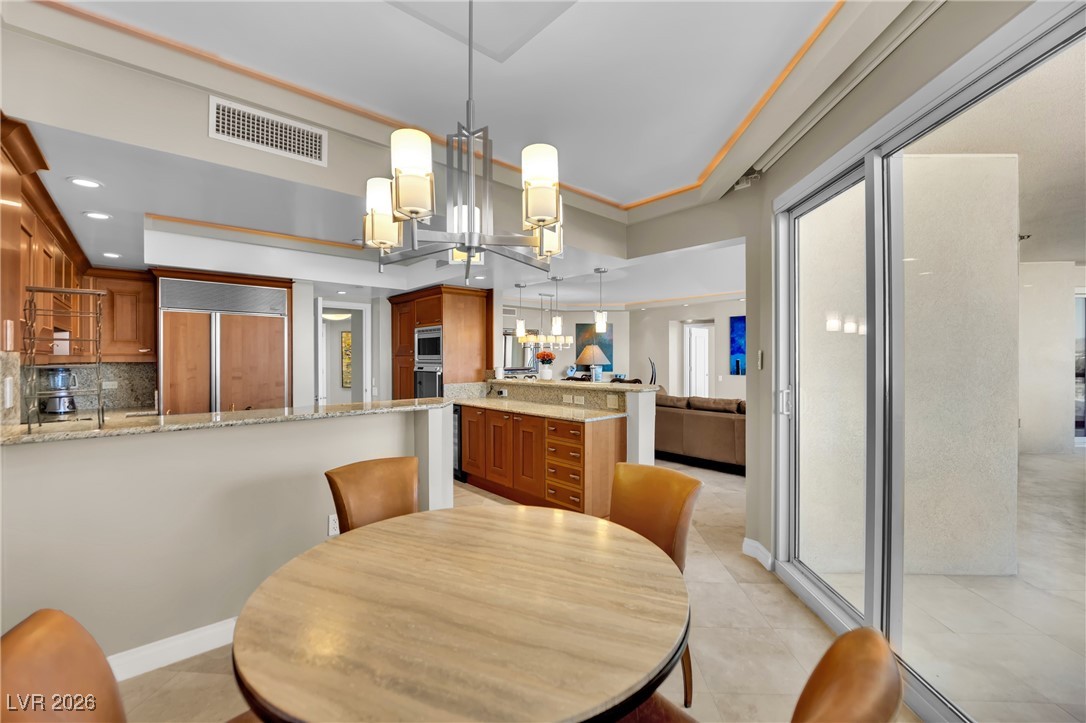 2777 Paradise Road, Unit 1803 Las Vegas, NV 89109 - Photo 13 of 48 Dining room with light tile patterned flooring and recessed lighting