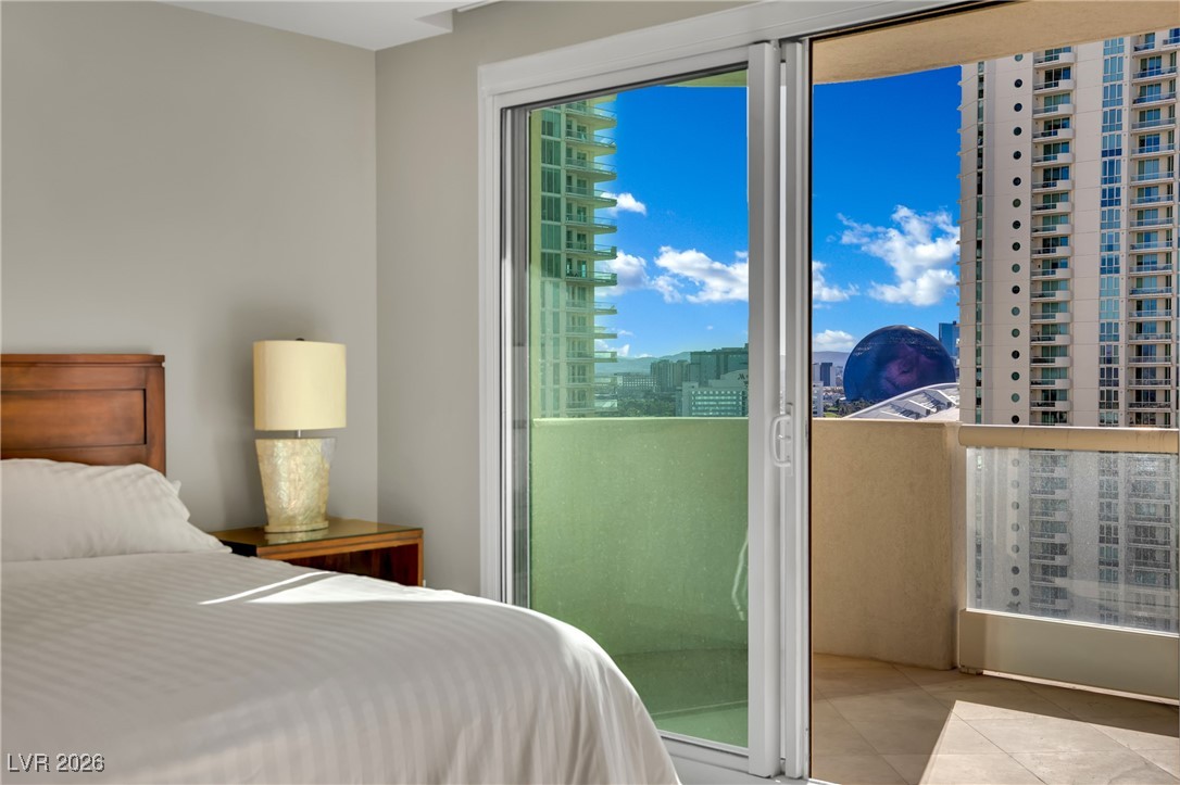 2777 Paradise Road, Unit 1803 Las Vegas, NV 89109 - Photo 27 of 48 Bedroom with access to outside and a city view