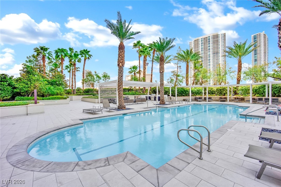 2777 Paradise Road, Unit 1803 Las Vegas, NV 89109 - Photo 35 of 48 Community pool featuring a patio area