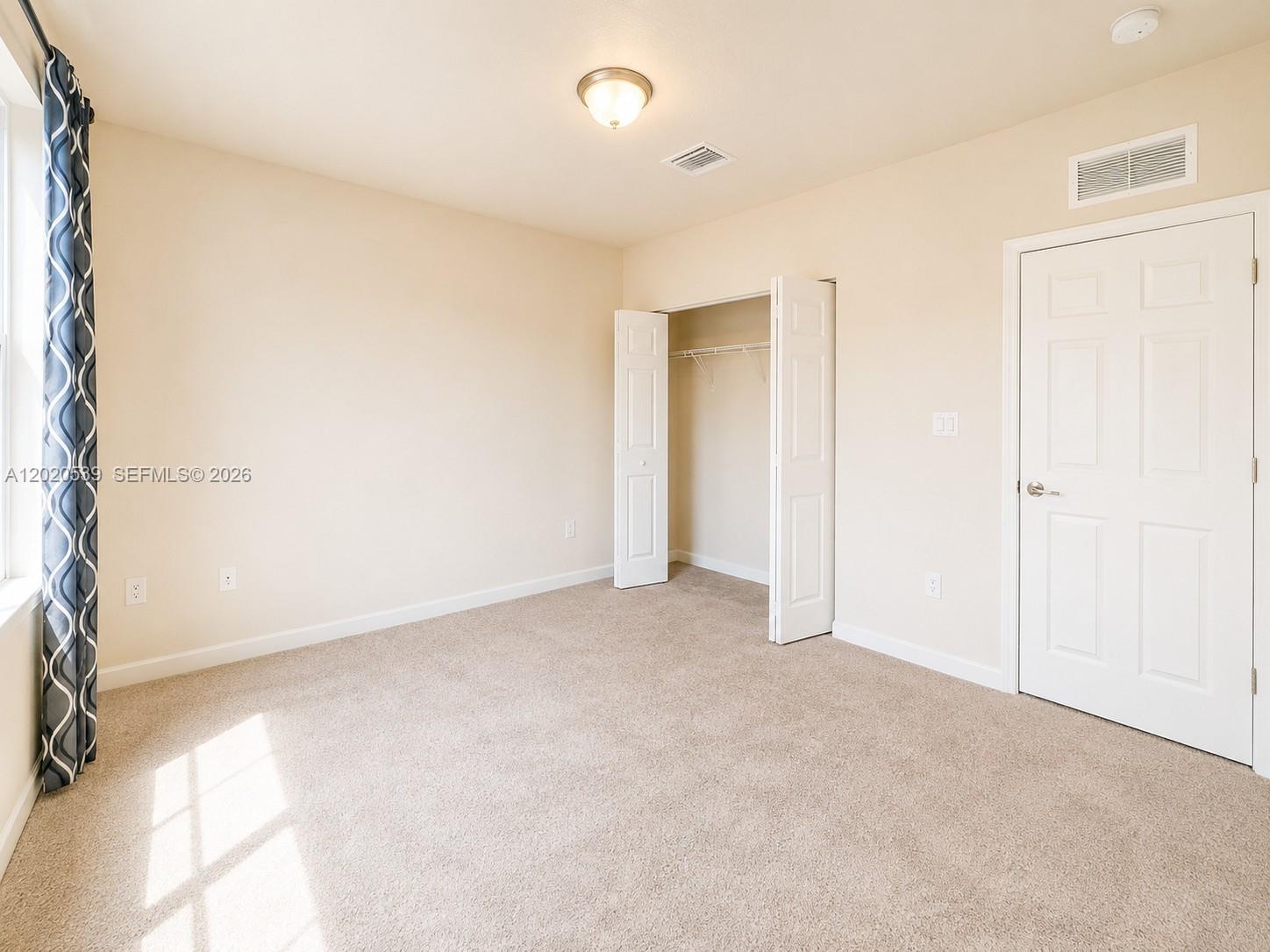 17001 Southwest 96th Street Miami, FL 33196 - Photo 13 of 23 a view of an empty room