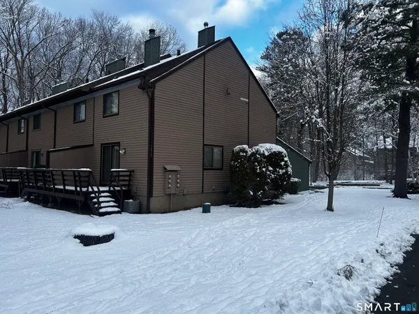 a view of outdoor space with deck and barbeque oven