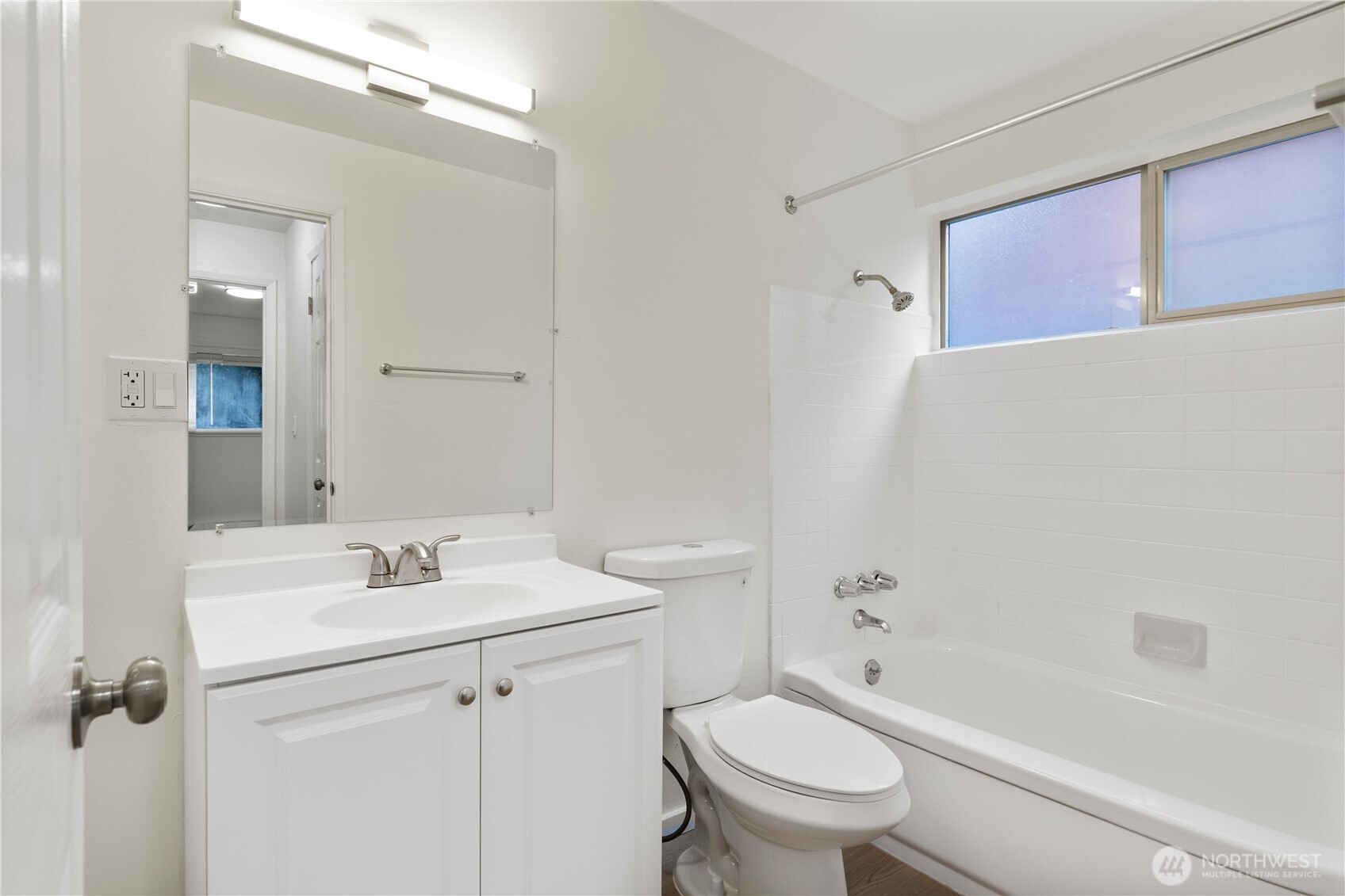 2614 Rucker Avenue Everett, WA 98201 - Photo 16 of 17 a bathroom with a sink a toilet and shower