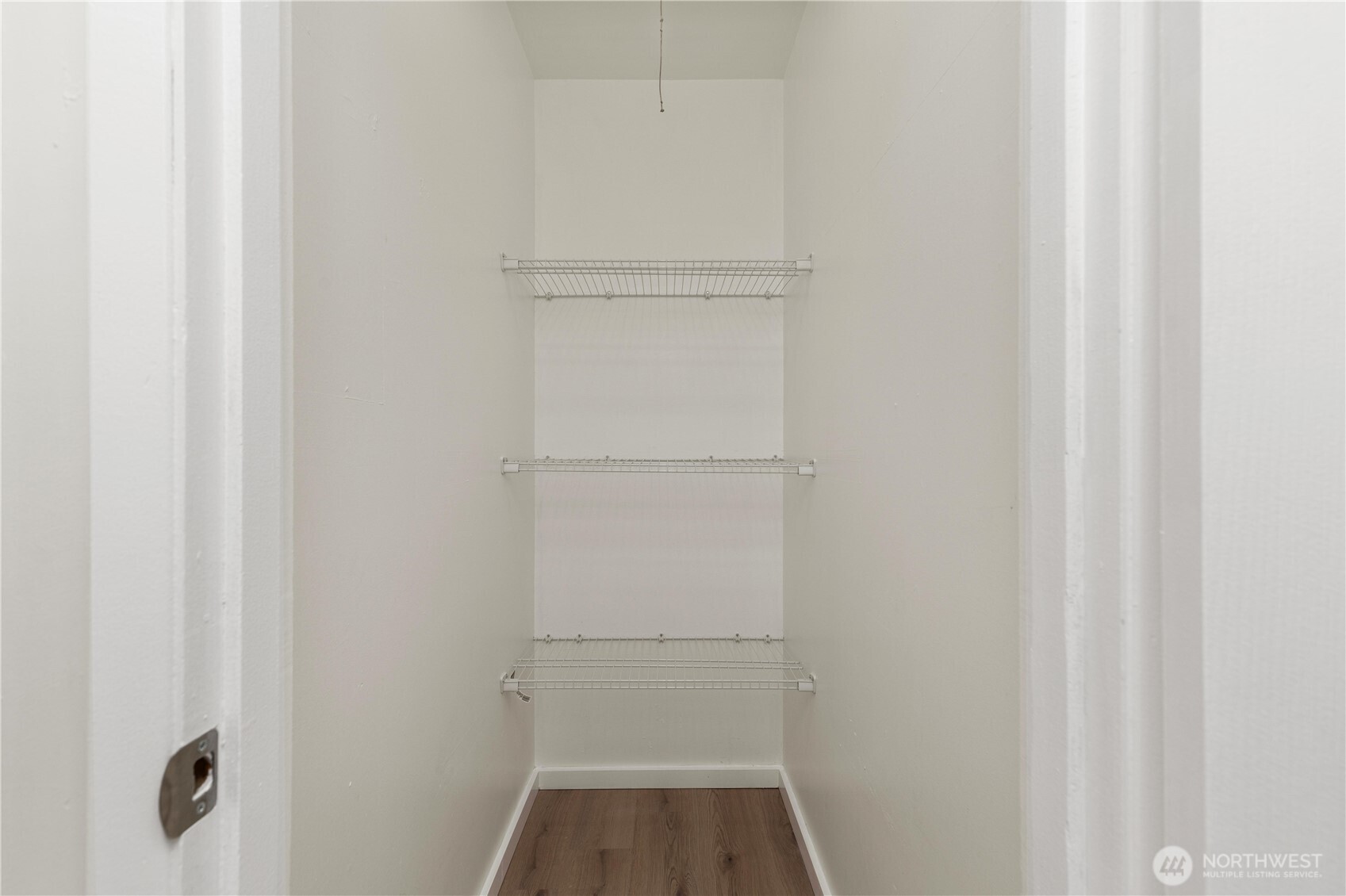 2614 Rucker Avenue Everett, WA 98201 - Photo 17 of 17 a view of walk in closet with empty racks
