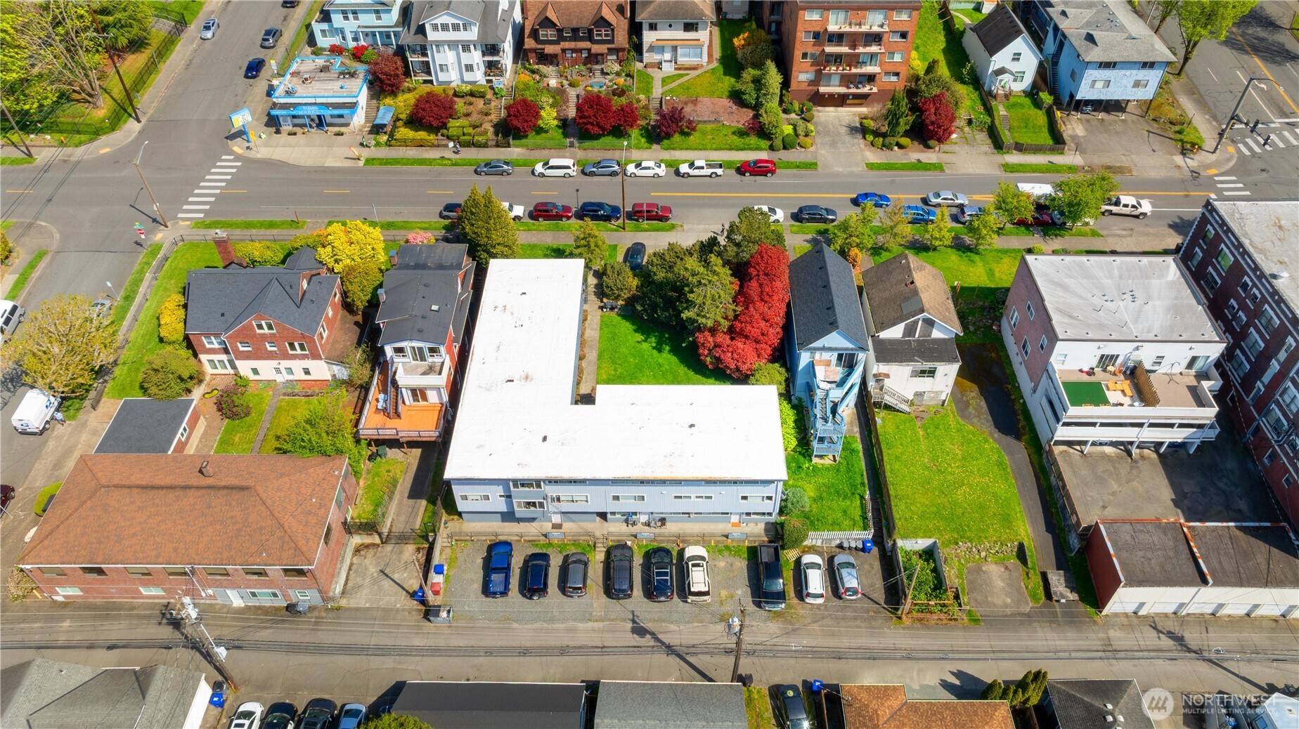 2614 Rucker Avenue Everett, WA 98201 - Photo 4 of 17 an aerial view of multiple houses with swimming pool
