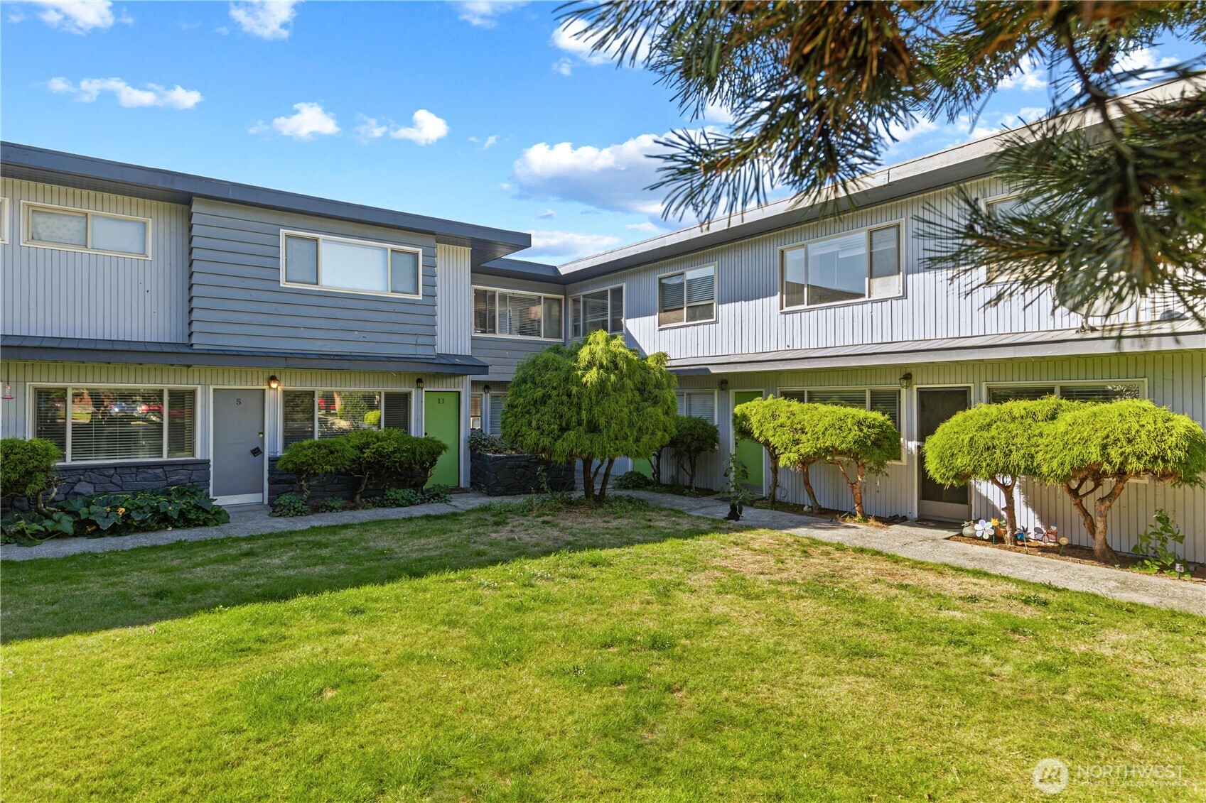 2614 Rucker Avenue Everett, WA 98201 - Photo 5 of 17 a view of a building with a yard