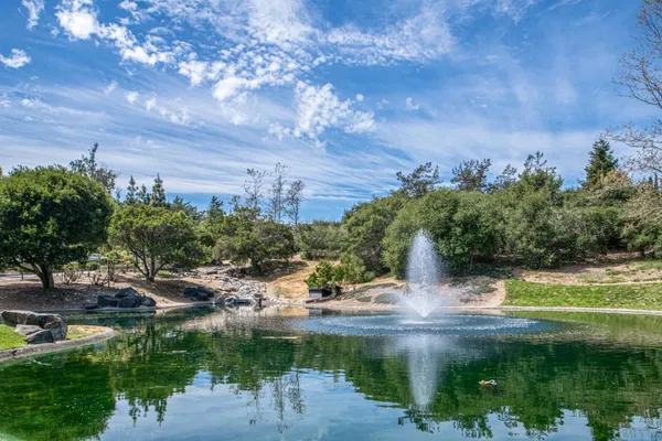 a view of balcony with wooden floor