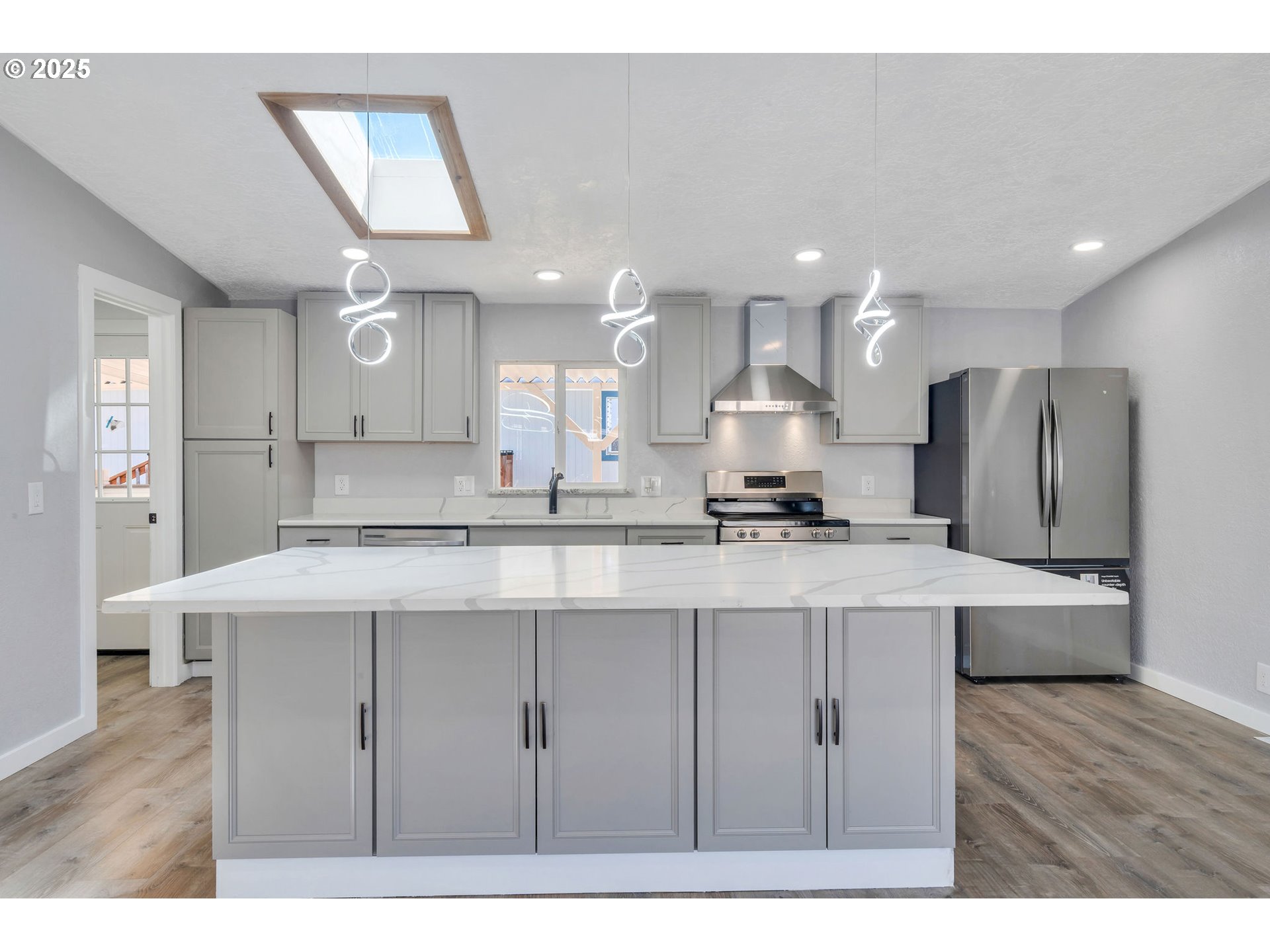 3554 Turner Road Southeast Salem, OR 97302 - Photo 13 of 26 a kitchen with stainless steel appliances granite countertop a sink a stove a refrigerator and a oven