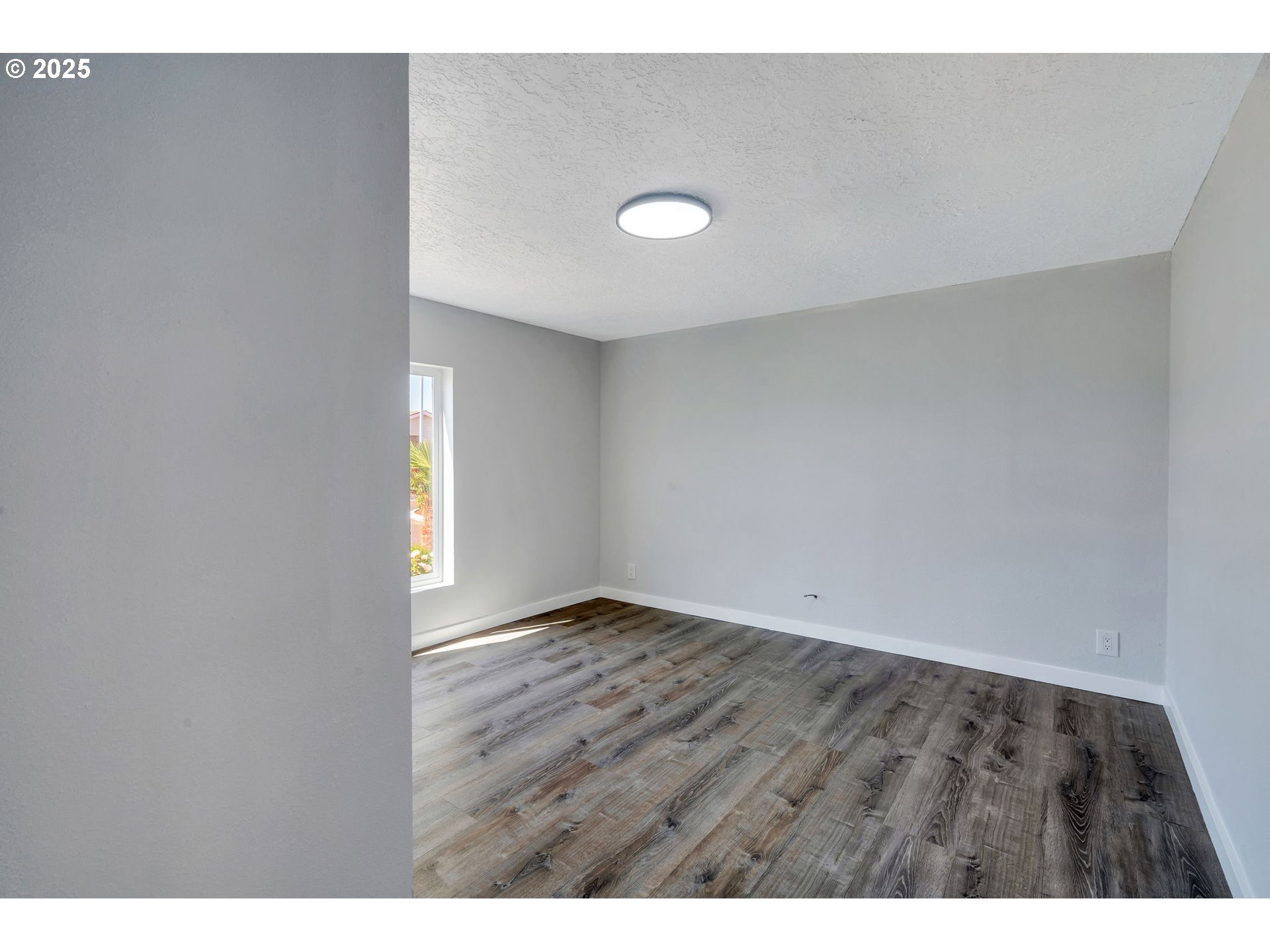 3554 Turner Road Southeast Salem, OR 97302 - Photo 14 of 26 a view of an empty room and window