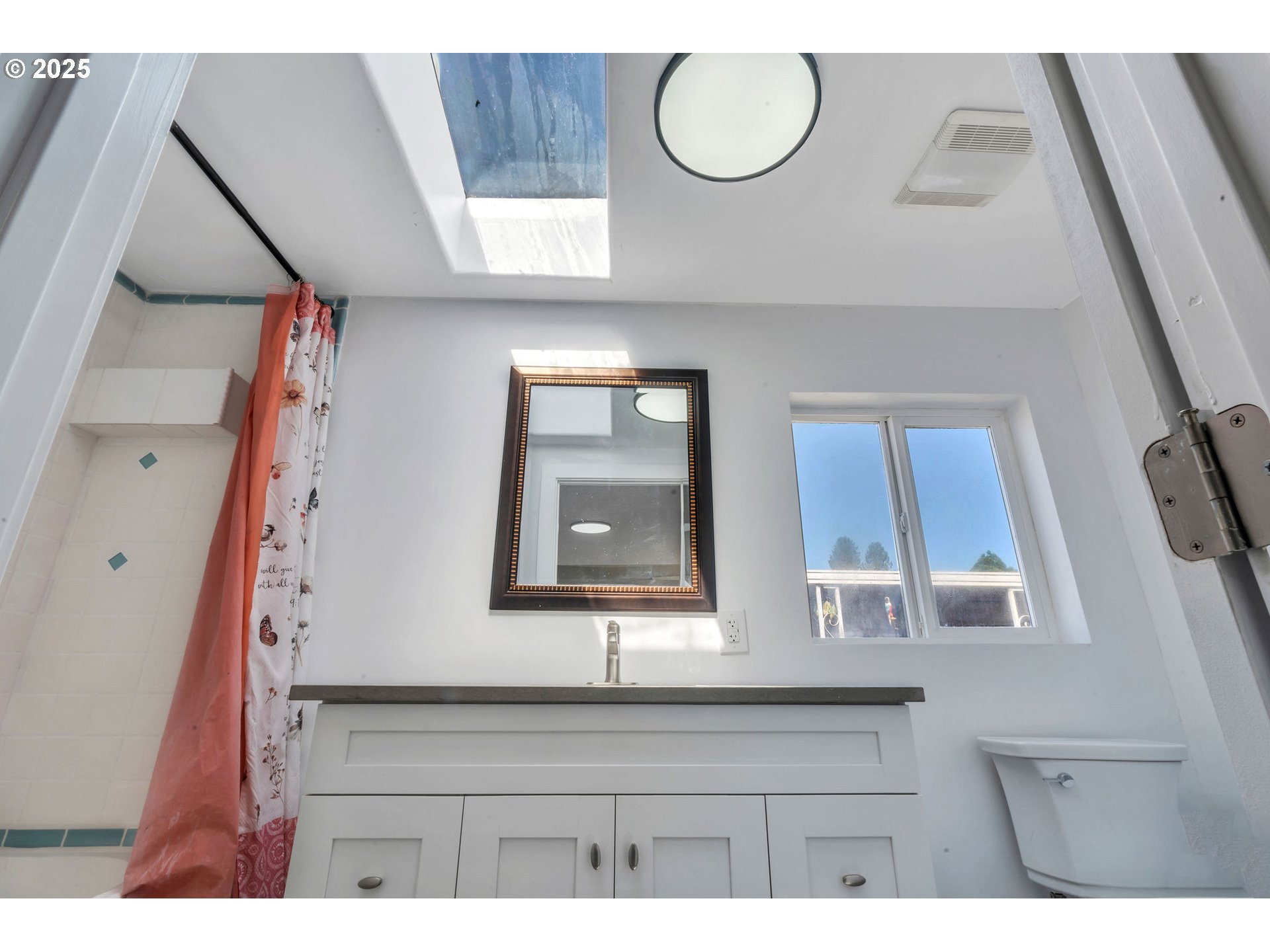 3554 Turner Road Southeast Salem, OR 97302 - Photo 23 of 26 a bathroom with a sink a mirror and vanity