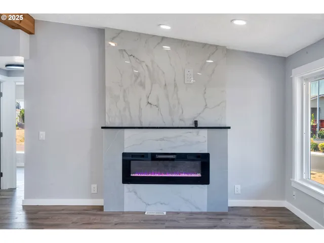 a living room with a fireplace