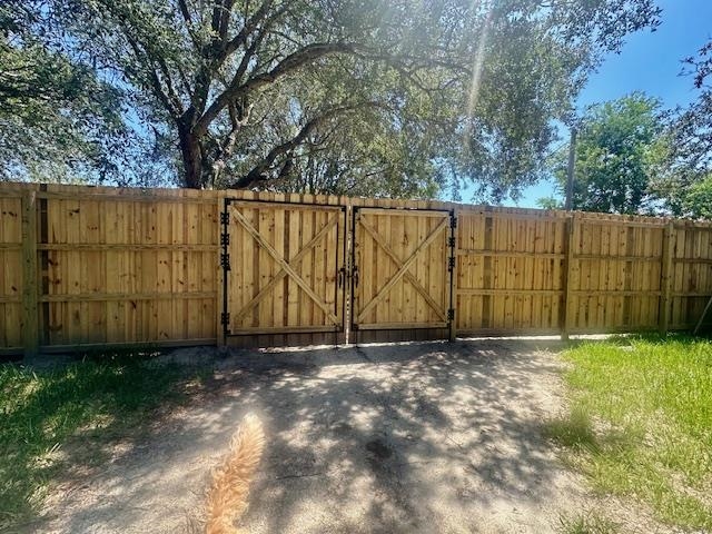 311 Micklers Road St. Augustine, FL 32080 - Photo 5 of 12 a view of backyard with wooden fence