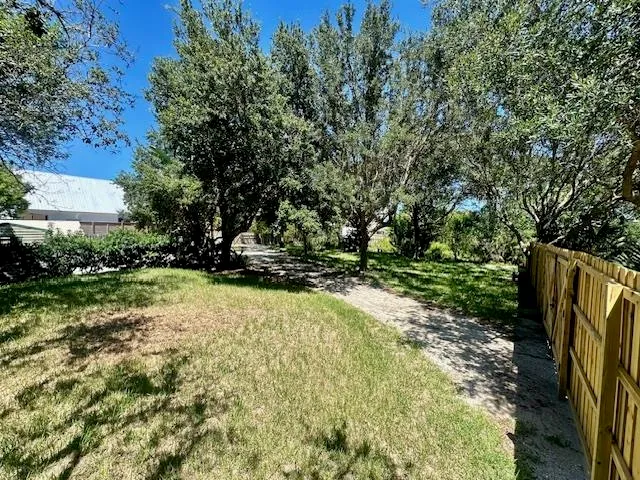a view of backyard with outdoor space