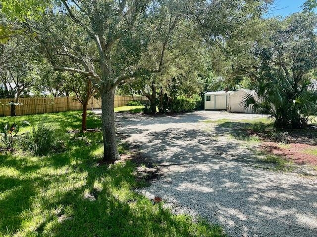 311 Micklers Road St. Augustine, FL 32080 - Photo 8 of 12 a big yard with lots of green space and fountain