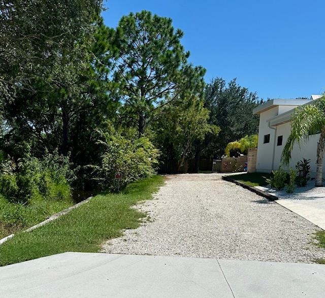 311 Micklers Road St. Augustine, FL 32080 - Photo 10 of 12 a pathway of a house with a yard