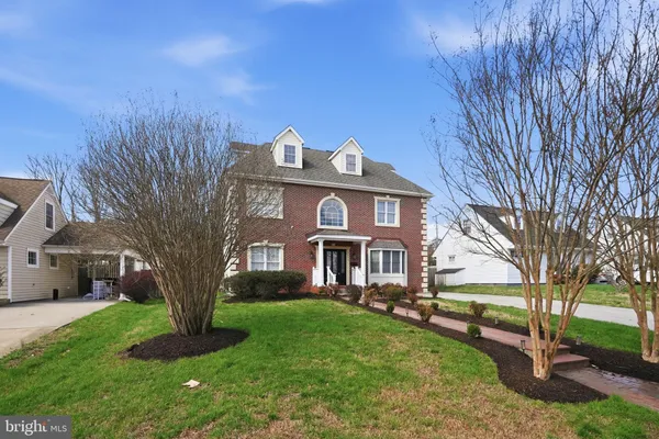 a kitchen with cabinets and window