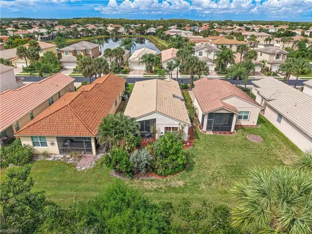 an aerial view of a house with a garden