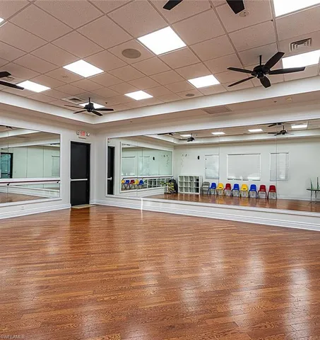 a view of a studio with wooden floor